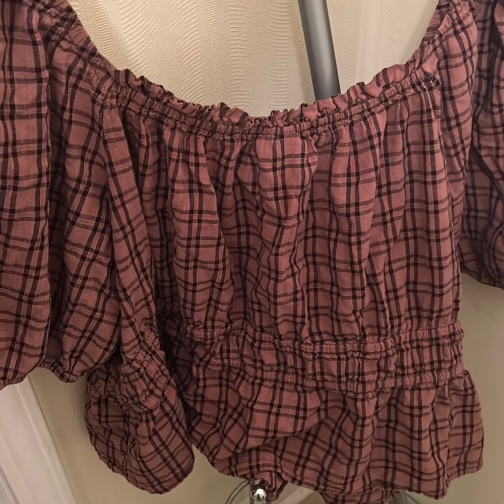Plaid top , brown and black in color puff sleeves